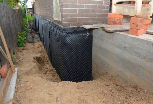 Happy homeowners after waterproofing job in Monteagle